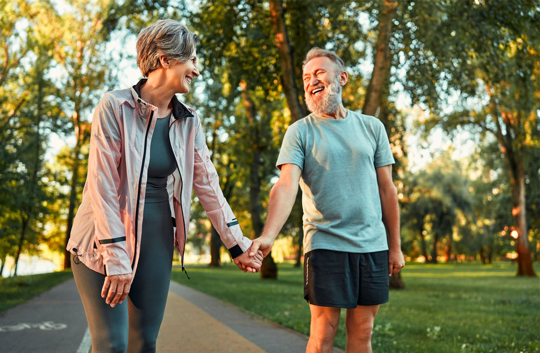 cheerful-modern-senior-couple-outdoors-in-the-park-small