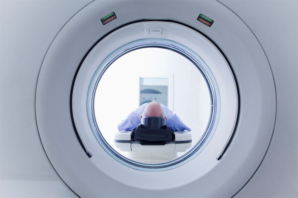 patient-lying-down-on-ct-scanner-mobile