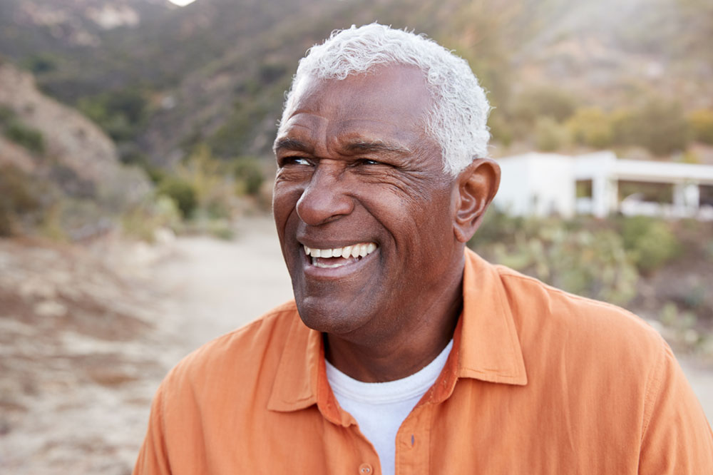 portrait-of-smiling-african-american-senior-man-ou-2024-10-19-11-13-05-utc