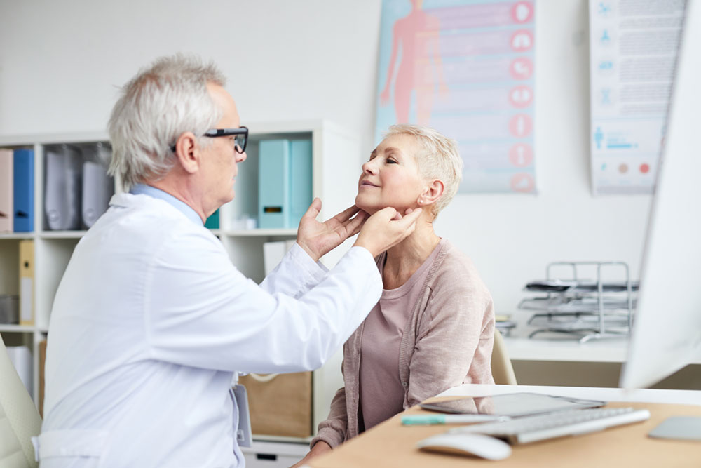 touching-patients-neck-during-checkups-2025-03-18-22-20-17-utc